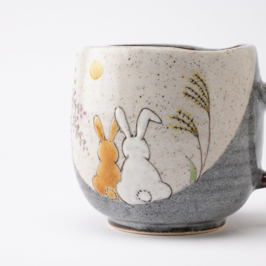 Rabbits In Sunny Spot Mug