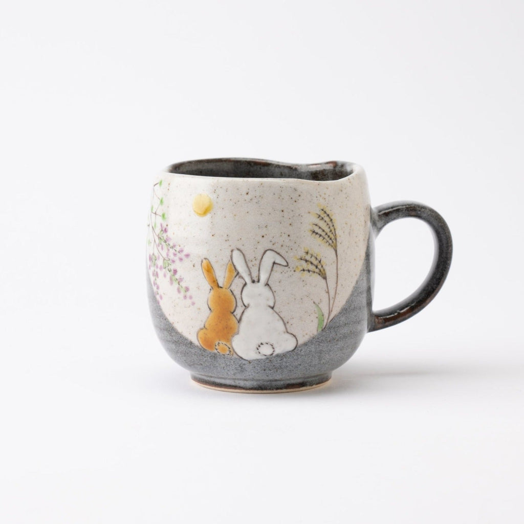 Rabbits In Sunny Spot Mug