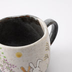 Rabbits In Sunny Spot Mug