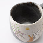 Rabbits In Sunny Spot Mug