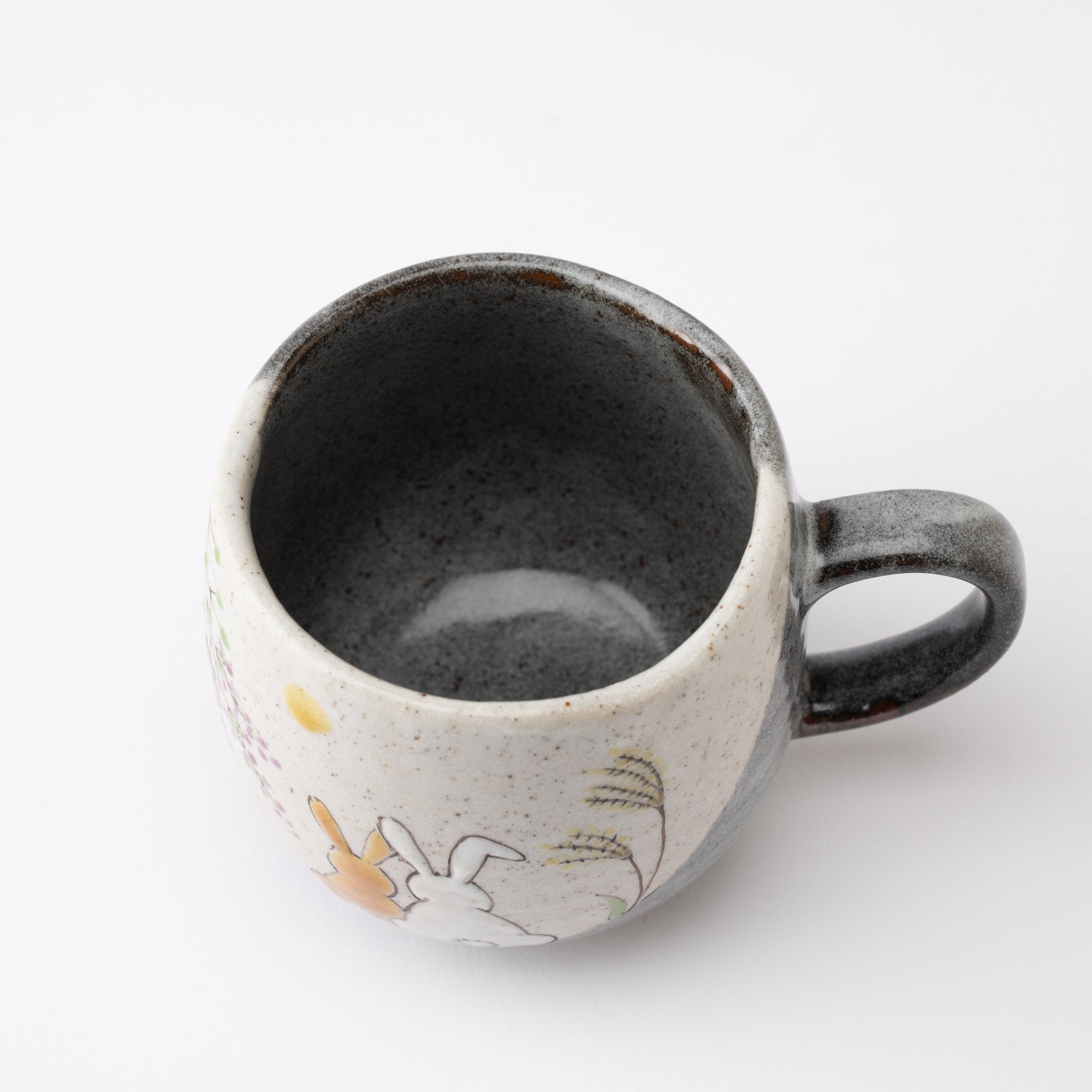 Rabbits In Sunny Spot Mug