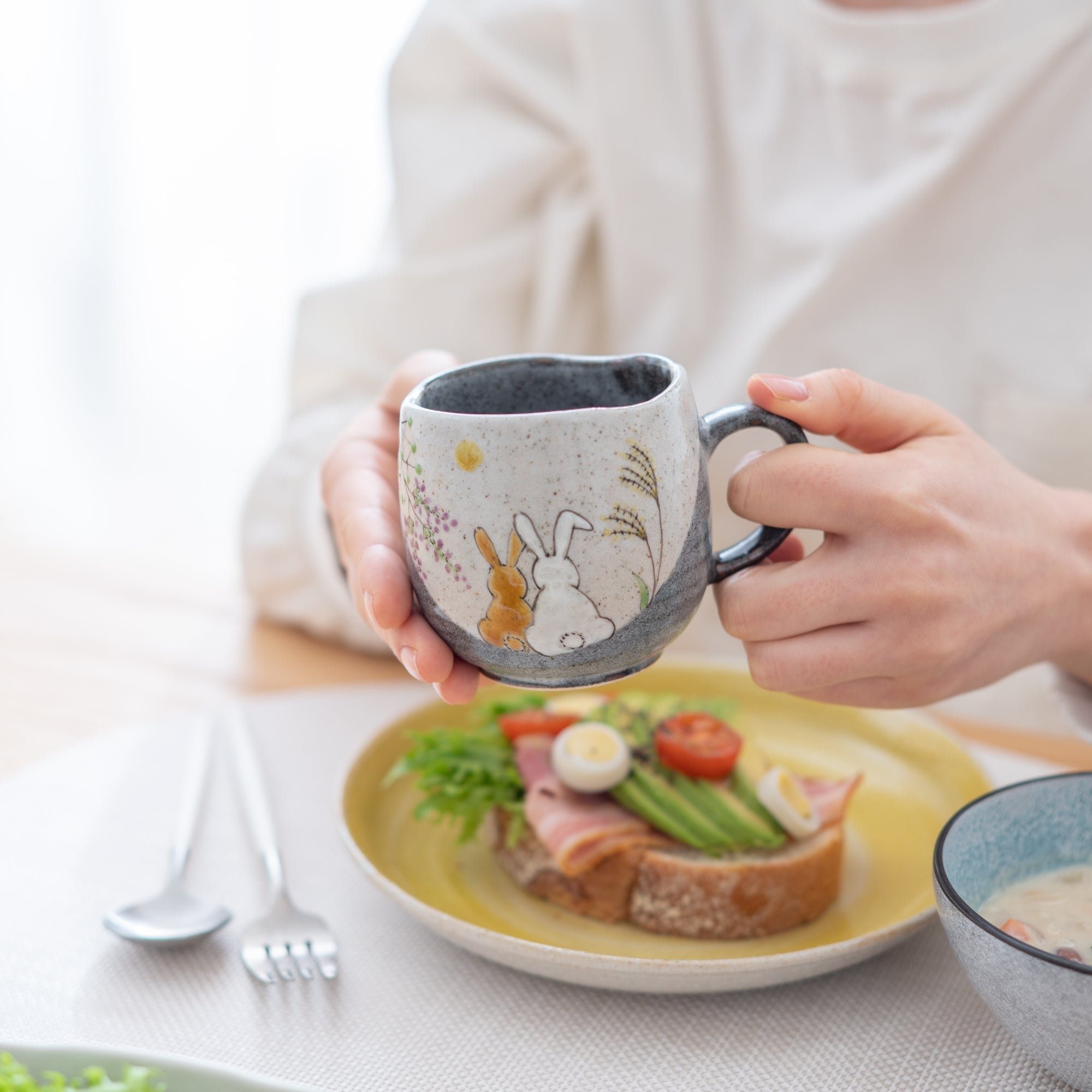 Rabbits In Sunny Spot Mug