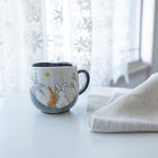 Rabbits In Sunny Spot Mug